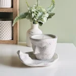 Veidas su puodeliu (RNG NR5-2)